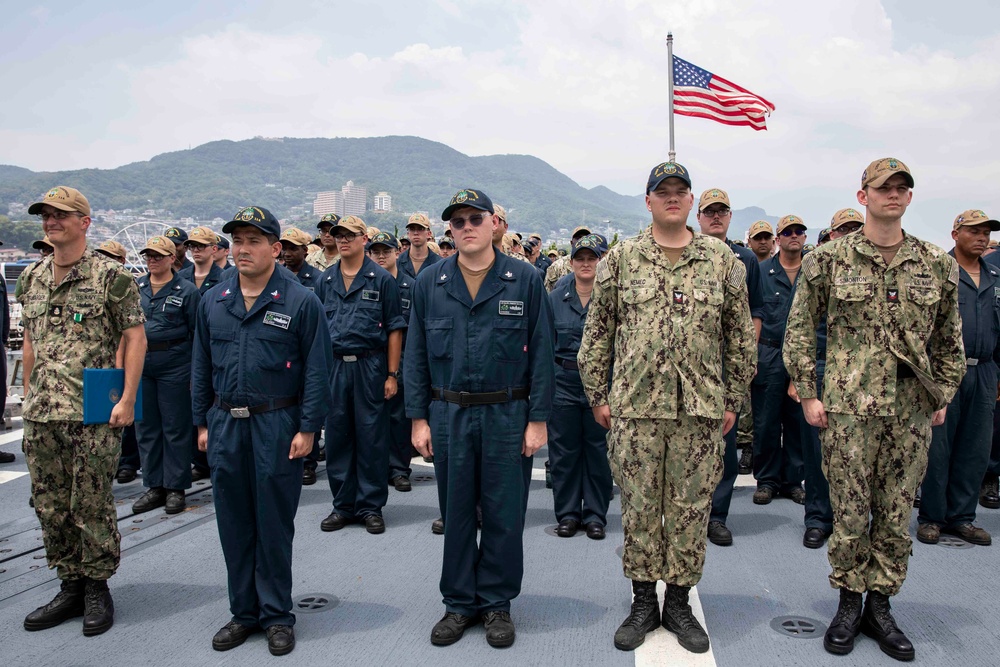 USS Ralph Johnson conducts an all-hands call in Sasebo, Japan.