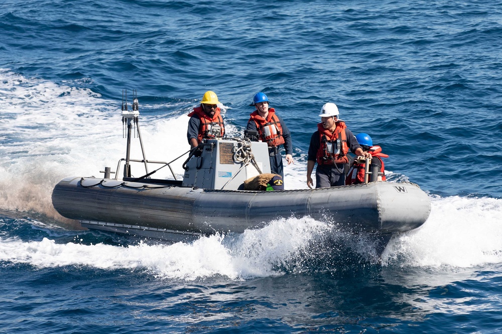 USS Antietam (CG 54) Sailors Operate a RHIB