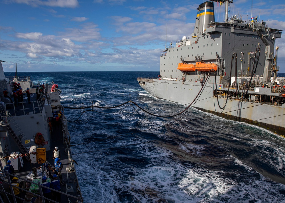 USS Rafael Peralta (DDG 115) conducts a replenishment-at-sea with the Military Sealift Command fleet replenishment oiler USNS Tippecanoe (T-AO 199)