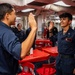 USS Rafael Peralta (DDG 115) conducts a reenlistment ceremony on the mess decks