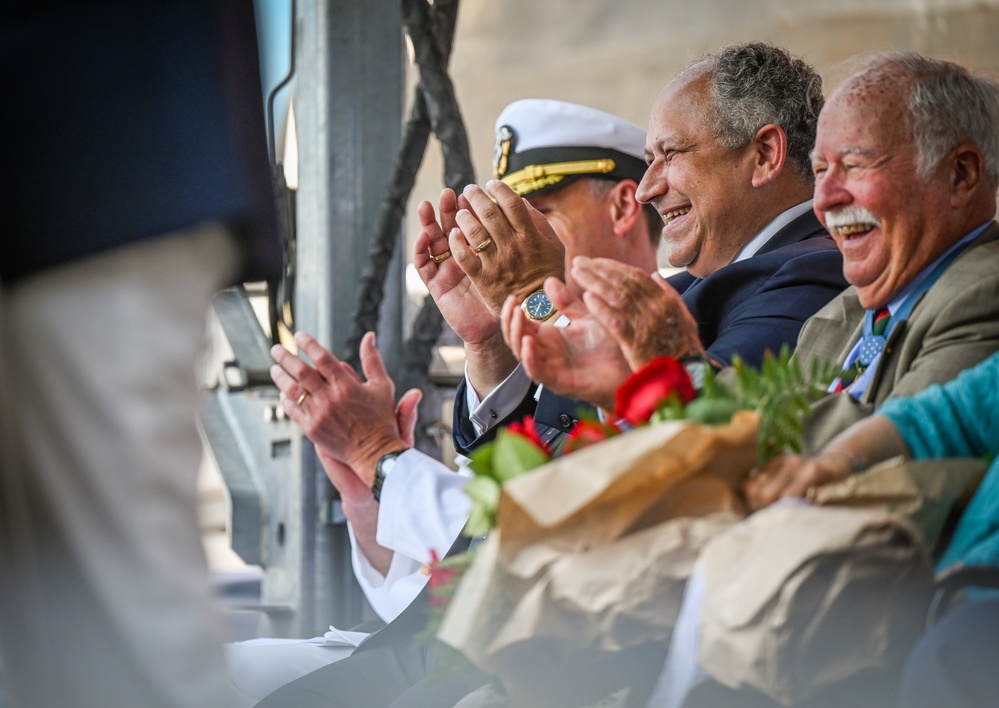 Secretary of the Navy Carlos Del Toro delivers remarks during the christening ceremony of USS Harvey C. Barnum Jr. (DDG 124)