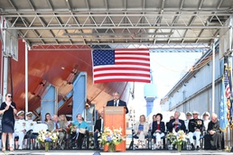 Secretary of the Navy Carlos Del Toro delivers remarks during the christening ceremony of USS Harvey C. Barnum Jr. (DDG 124)