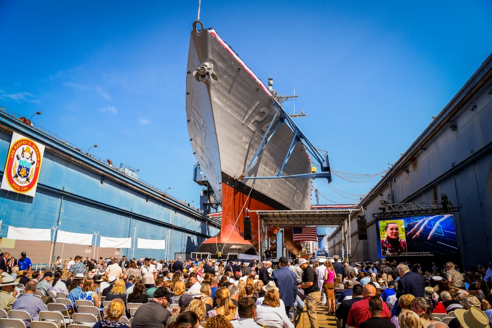 Secretary of the Navy Carlos Del Toro delivers remarks during the christening ceremony of USS Harvey C. Barnum Jr. (DDG 124)