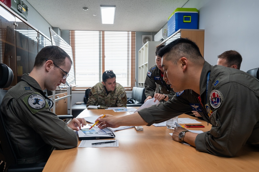 Wolf Pack trains on ground, in the sky with ROKAF fighter squadron