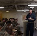 Rear Admiral Stone briefs SNCOs aboard USS America