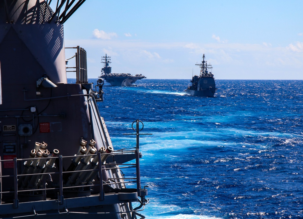 USS Robert Smalls (CG 62) sails alongside USS Ronald Reagan (CVN 76) and USS Antietam (CG 54) during Talisman Sabre 2023