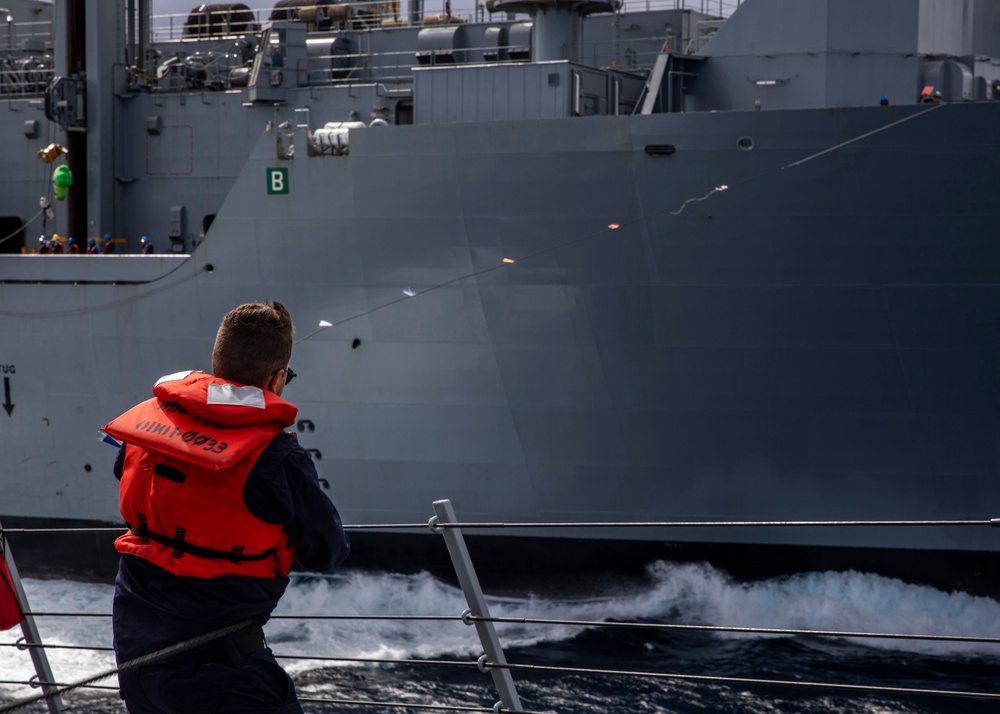 USS Rafael Peralta (DDG 115) conducts a replenishment-at-sea with the Military Sealift Command fleet replenishment oiler USNS Matthew Perry (T-AKE 9)