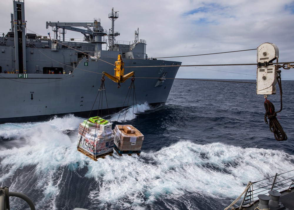 USS Rafael Peralta (DDG 115) conducts a replenishment-at-sea with the Military Sealift Command fleet replenishment oiler USNS Matthew Perry (T-AKE 9)