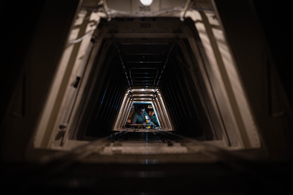 C-17 aircraft structural maintenance technicians perform subfloor refurbishment