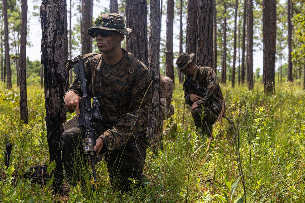 Midshipmen conduct fire and maneuver during CORTRAMID