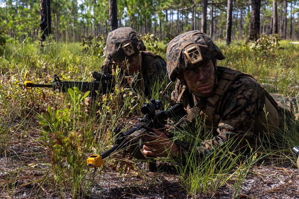 Midshipmen conduct fire and maneuver during CORTRAMID