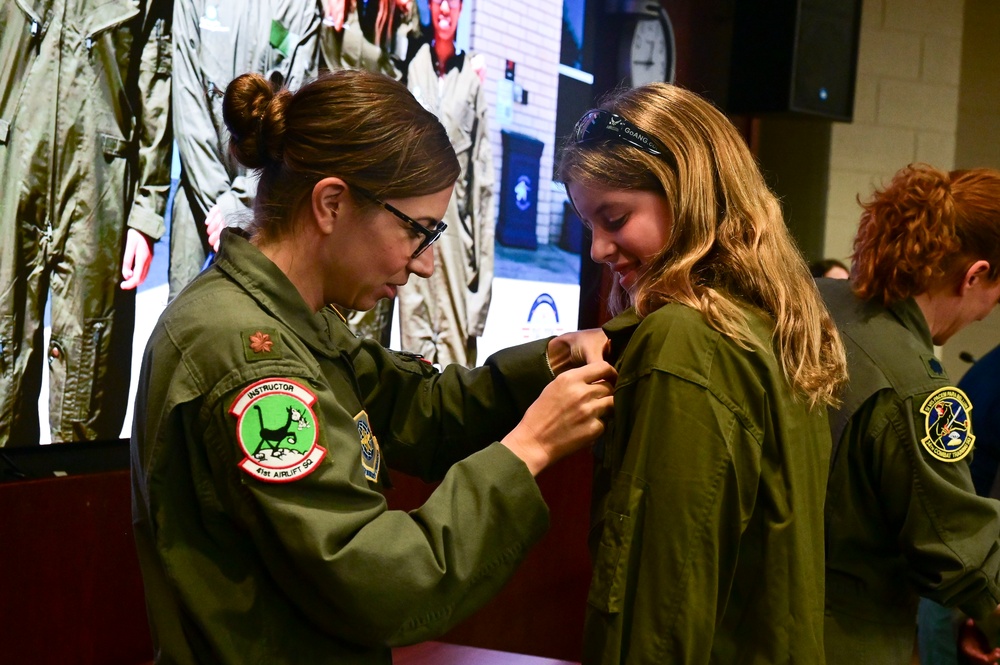 All-female aircrew, TLR Airmen participate in Smithsonian’s &quot;S.H.E. Can&quot; graduation