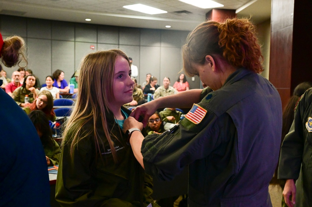 All-female aircrew, TLR Airmen participate in Smithsonian’s &quot;S.H.E. Can&quot; graduation