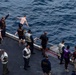 USS Ronald Reagan (CVN 76) celebrates the 20th anniversary of its commissioning with a swim call