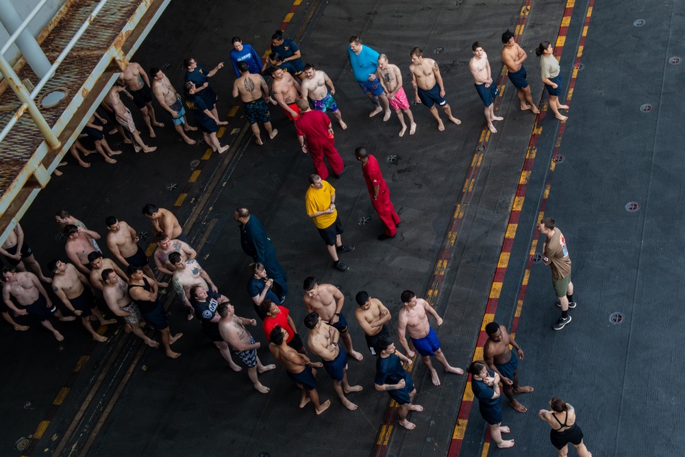 USS Ronald Reagan (CVN 76) celebrates the 20th anniversary of its commissioning with a swim call