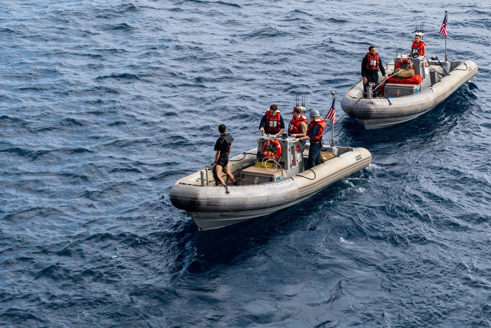 USS Ronald Reagan (CVN 76) celebrates the 20th anniversary of its commissioning with a swim call