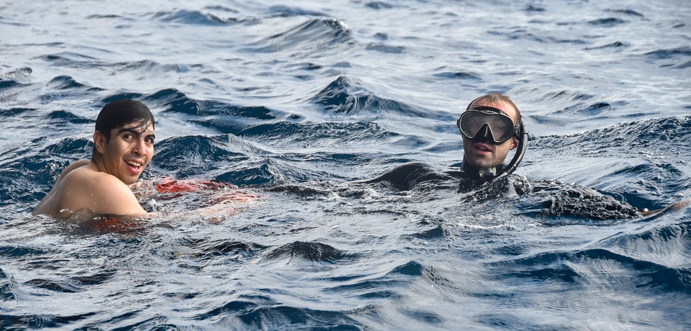 USS Ronald Reagan (CVN 76) celebrates the 20th anniversary of its commissioning with a swim call