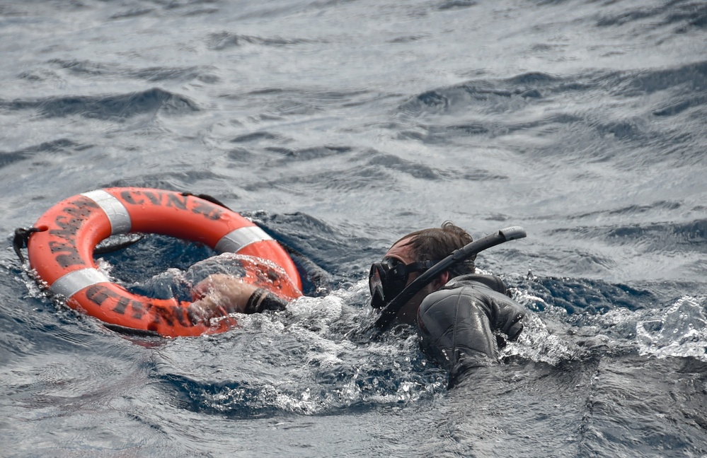 USS Ronald Reagan (CVN 76) celebrates the 20th anniversary of its commissioning with a swim call