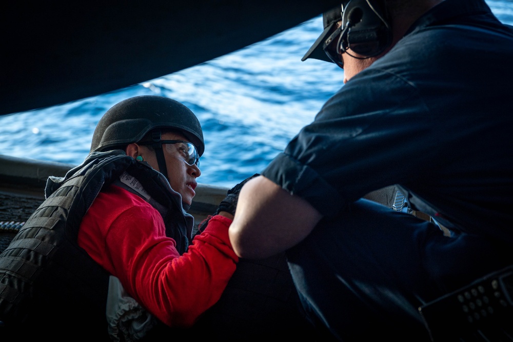 USS Ronald Reagan (CVN 76) Sailors participate in live fire exercise