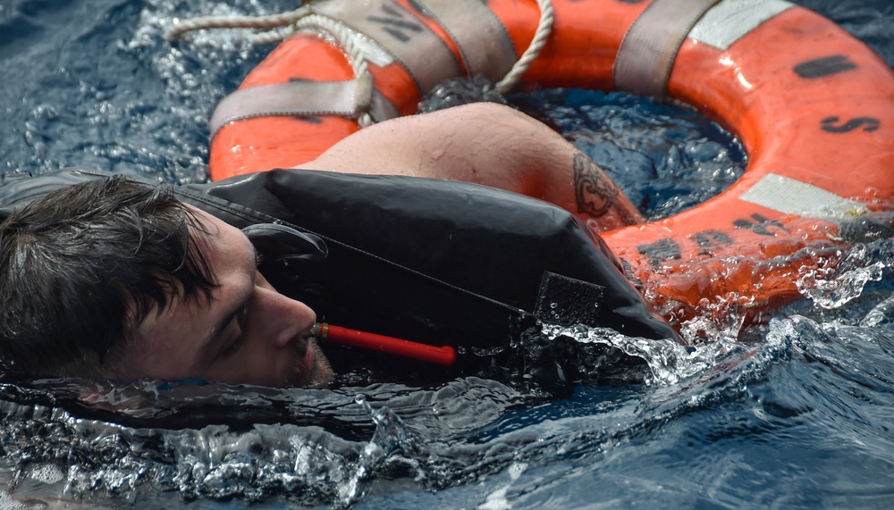 USS Ronald Reagan (CVN 76) celebrates the 20th anniversary of its commissioning with a swim call