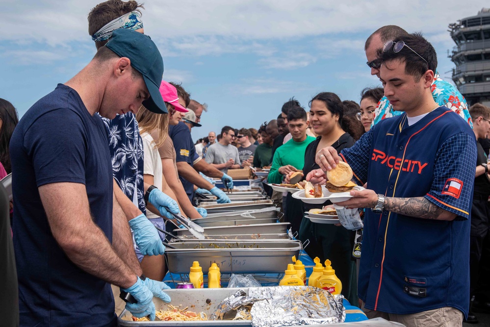 USS Ronald Reagan (CVN 76) holds a steel beach picnic during 20th anniversary of ship’s commissioning