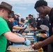 USS Ronald Reagan (CVN 76) holds a steel beach picnic during 20th anniversary of ship’s commissioning