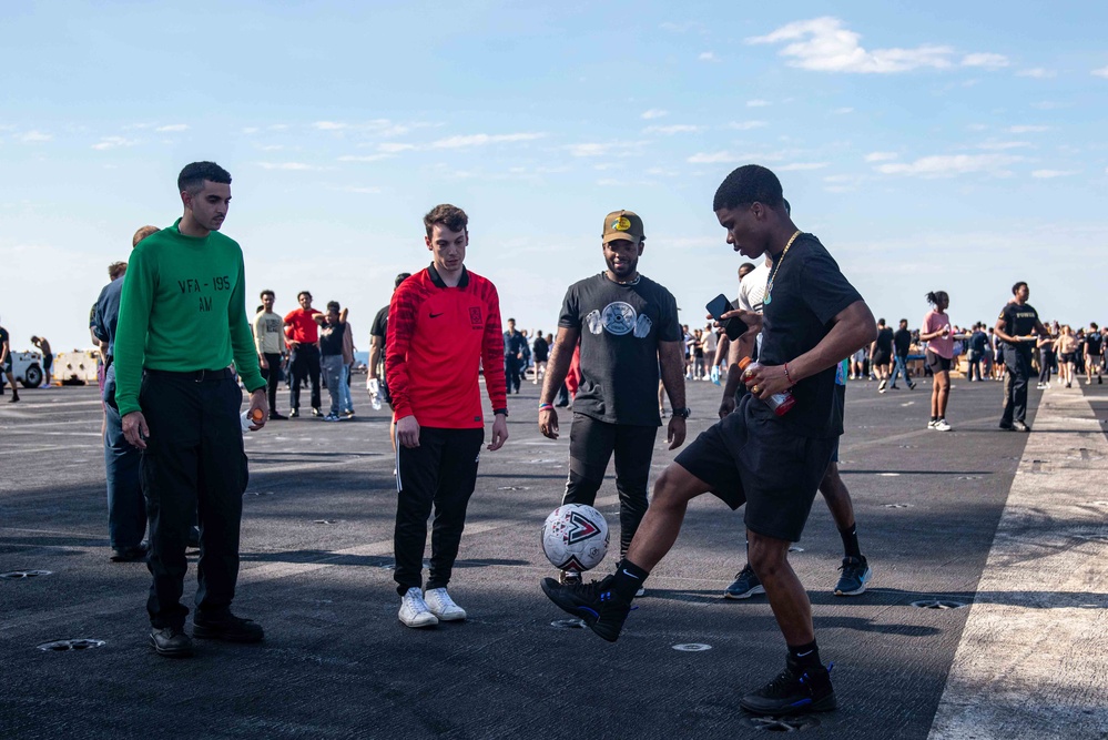 USS Ronald Reagan (CVN 76) holds a steel beach picnic during 20th anniversary of ship’s commissioning