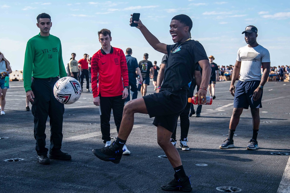 USS Ronald Reagan (CVN 76) holds a steel beach picnic during 20th anniversary of ship’s commissioning