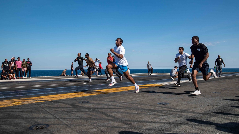 USS Ronald Reagan (CVN 76) holds a steel beach picnic during 20th anniversary of ship’s commissioning