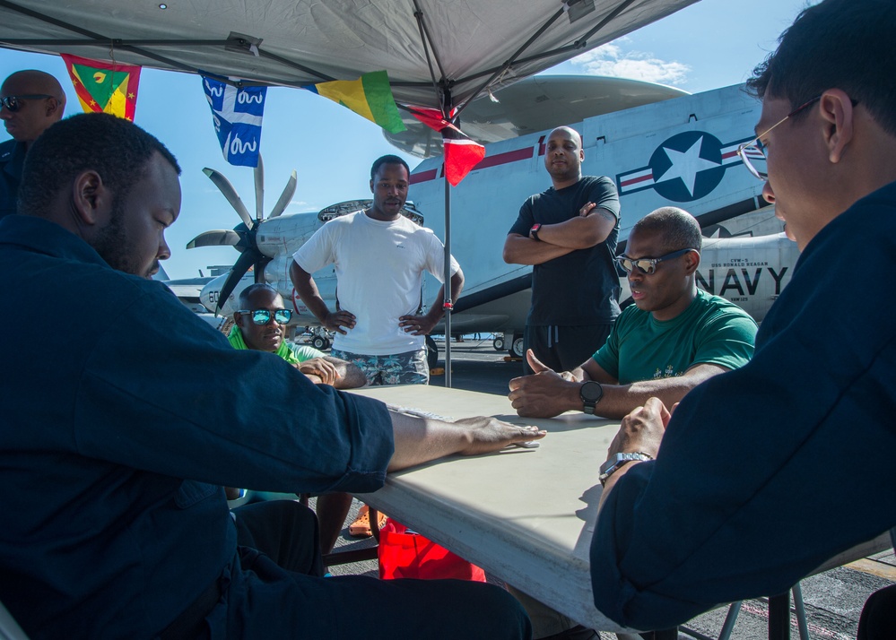 USS Ronald Reagan (CVN 76) holds a steel beach picnic during 20th anniversary of ship’s commissioning