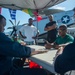 USS Ronald Reagan (CVN 76) holds a steel beach picnic during 20th anniversary of ship’s commissioning