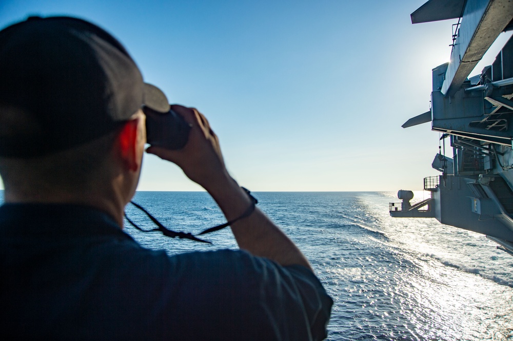 USS Ronald Reagan (CVN 76) Sailors participate in live fire exercise