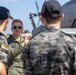 Royal Australian Navy Midshipmen learn about Marine Corps attack helicopters