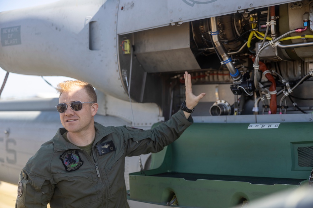 Royal Australian Navy Midshipmen learn about Marine Corps attack helicopters