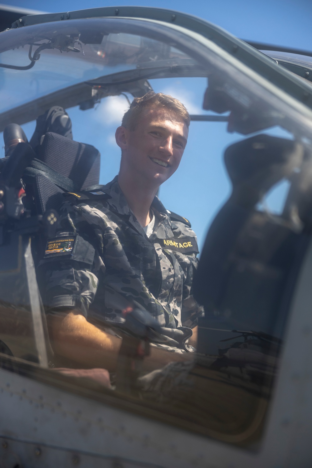 Royal Australian Navy Midshipmen learn about Marine Corps attack helicopters