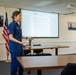 Women and Men at Coast Guard Base Los Angeles-Long Beach attend Women's Leadership Initiative meeting