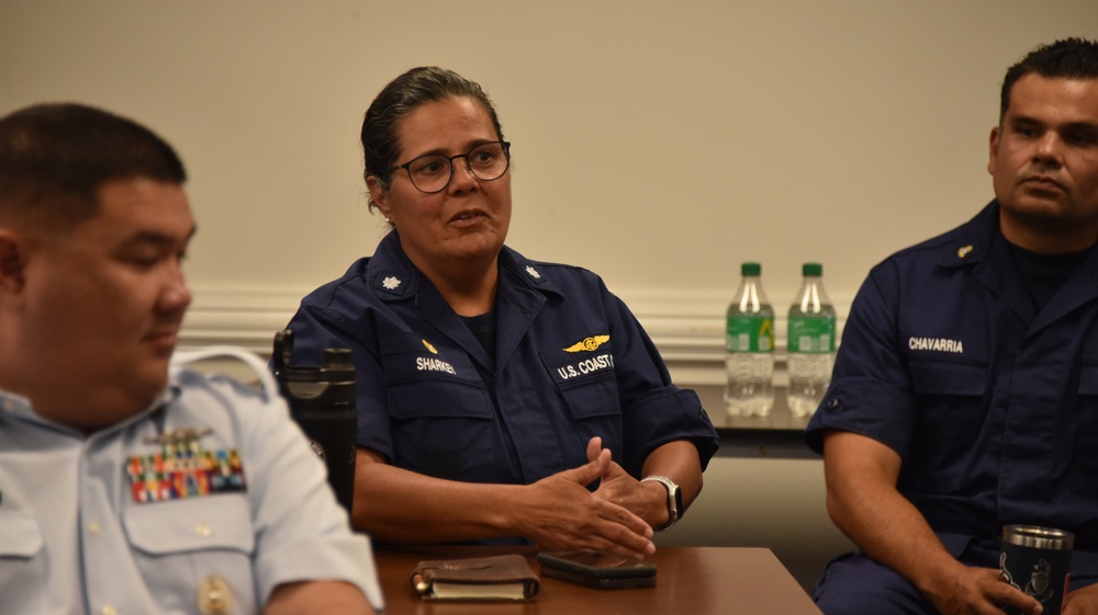 CAPTIONS: Women and Men at Coast Guard Base Los Angeles-Long Beach attend Women's Leadership Initiative meeting