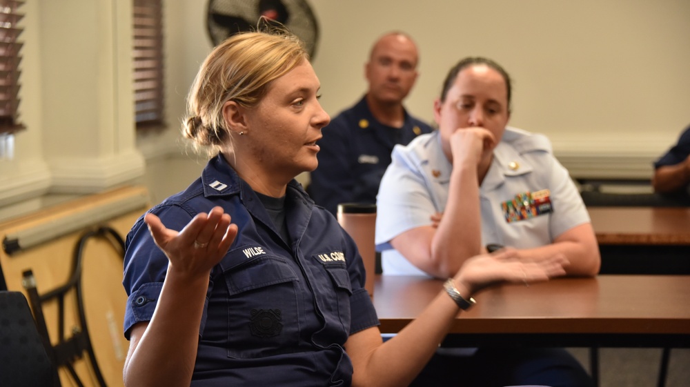 Women and Men at Coast Guard Base Los Angeles-Long Beach attend Women's Leadership Initiative meeting