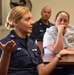 Women and Men at Coast Guard Base Los Angeles-Long Beach attend Women's Leadership Initiative meeting