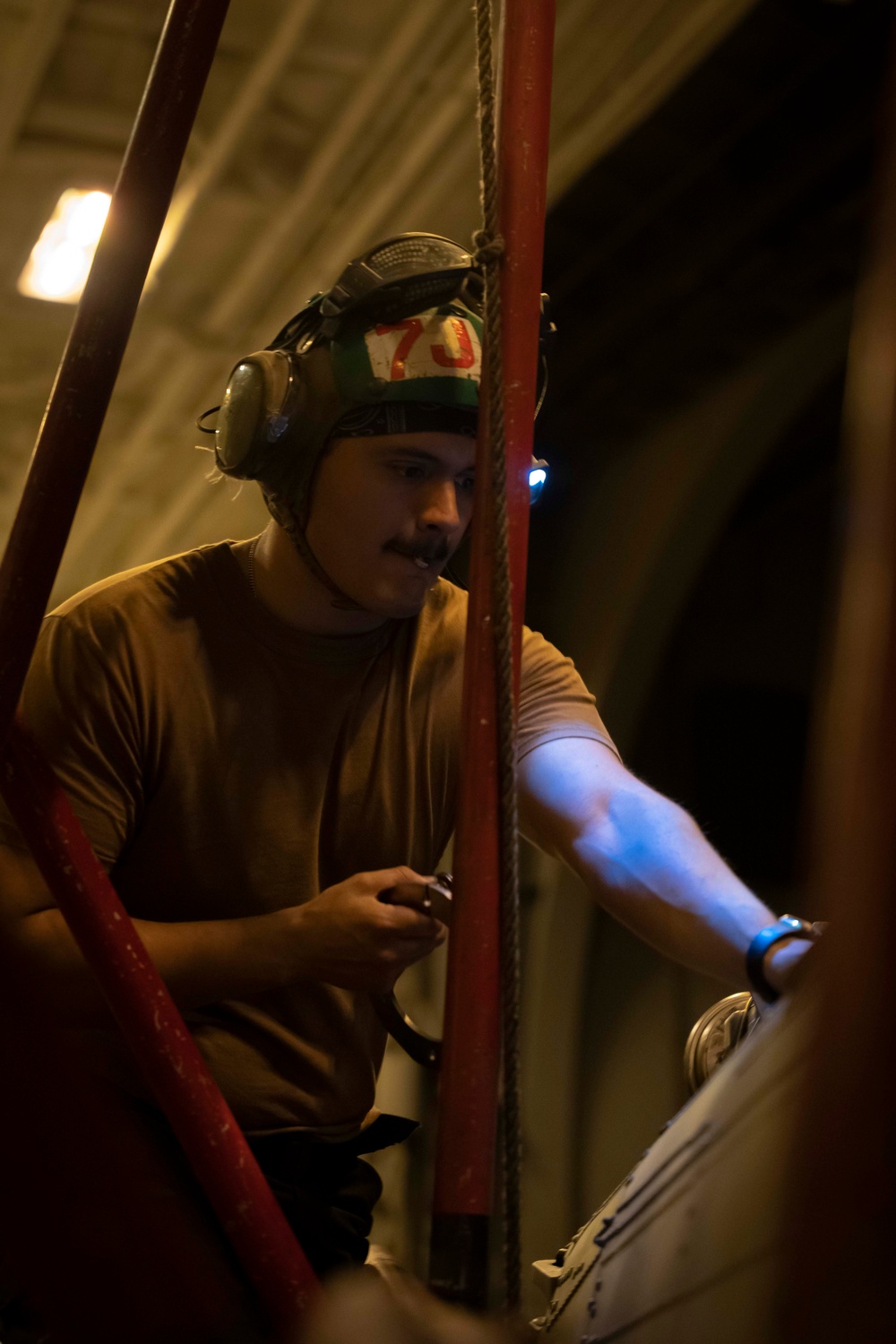 USS Carl Vinson (CVN 70) Sailors Perform Maintenance on Aircrafts in the Pacific Ocean