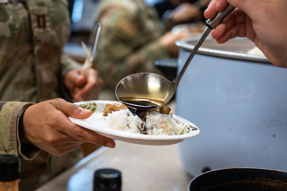 Wolf Pack Chapel, medical Airmen serve homemade meals