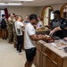 Wolf Pack Chapel, medical Airmen serve homemade meals