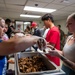 Wolf Pack Chapel, medical Airmen serve homemade meals