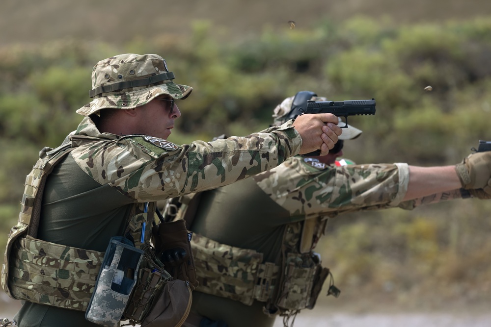 Hungarian soldiers practice firing at pistol range
