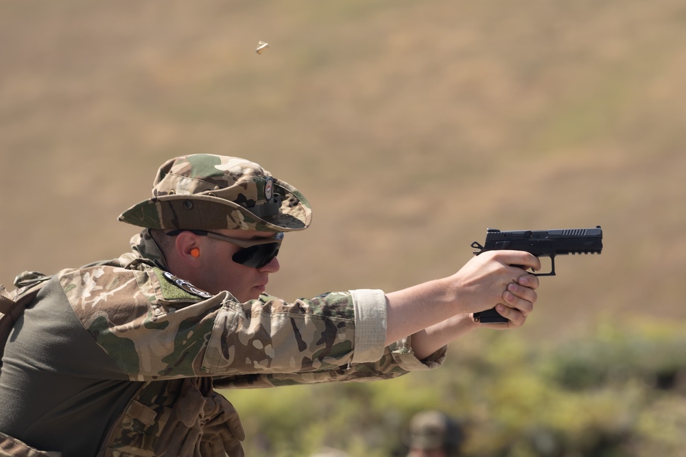 Hungarian soldiers practice firing at pistol range