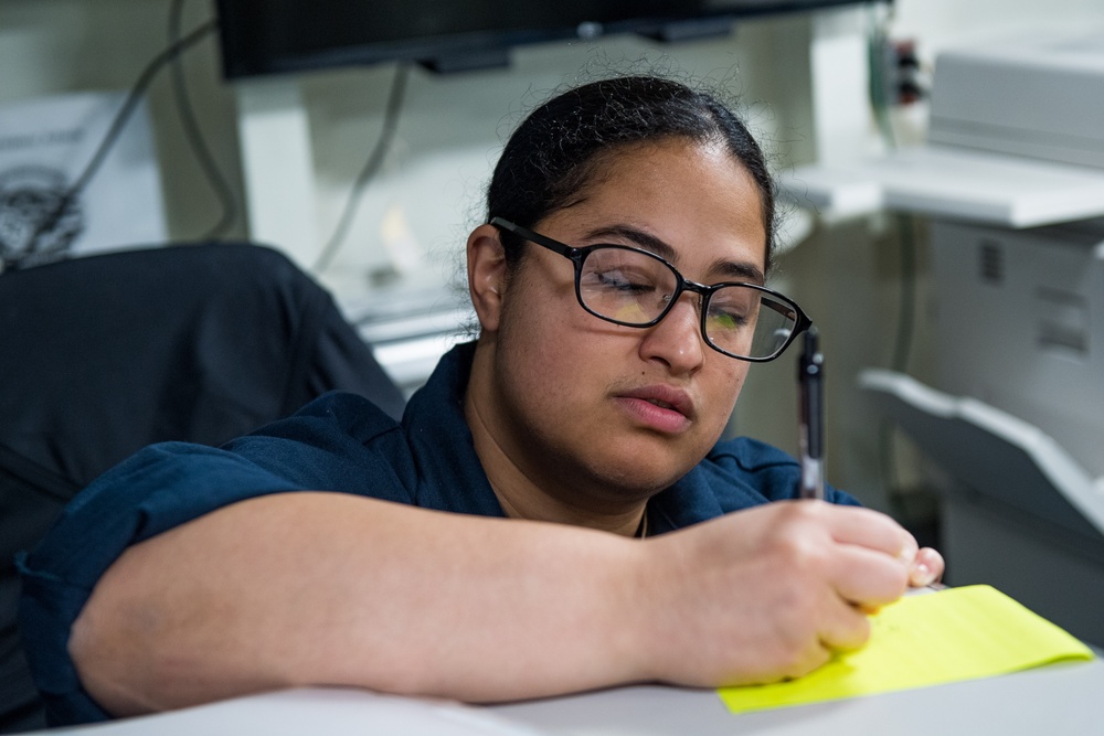 USS Ronald Reagan (CVN 76) Sailors perform daily administration tasks