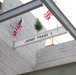 The final steel beam of the JADOC Phase Two construction project