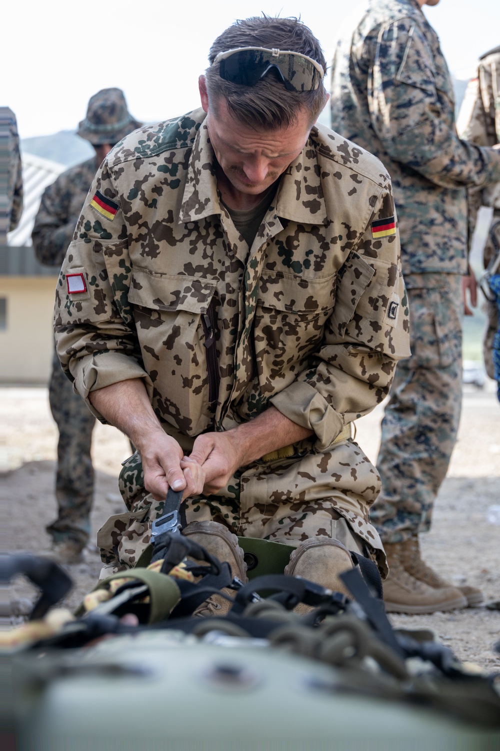 Mountain Medicine 1-23 learns knot tying techniques to help in Mountain Warfare