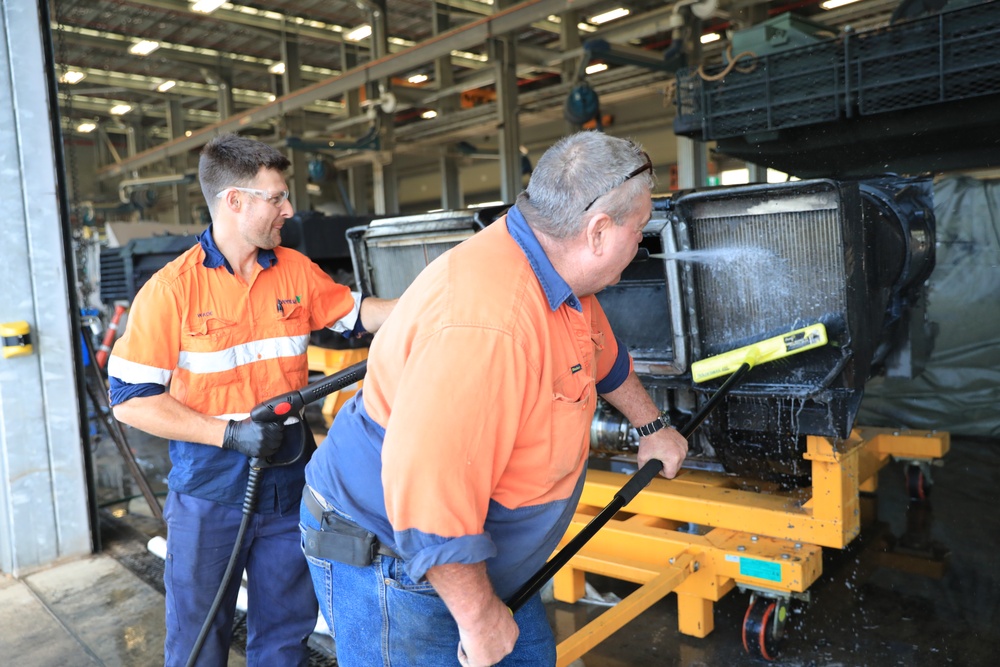 1st AD Soldiers and Australian contractors team up to repair M1A2 Abrams tank