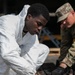 1st AD Soldiers and Australian contractors team up to repair M1A2 Abrams tank